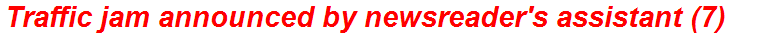 Traffic jam announced by newsreader's assistant (7)