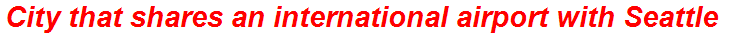 City that shares an international airport with Seattle
